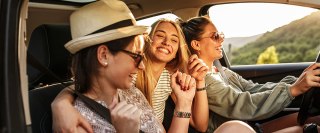 three happy women driving car and singing, roadtrip, vacation, holiday, girls, friends, summer